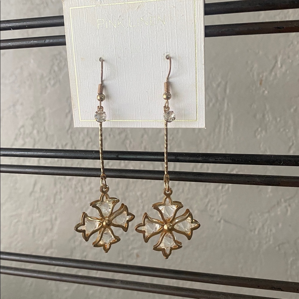 Vintage gold tone pink linen cross dangle earrings